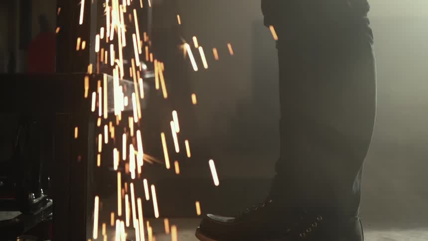 Sparks fly as a man welds