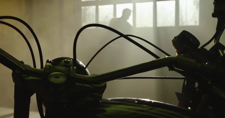 A man opens up a garage door