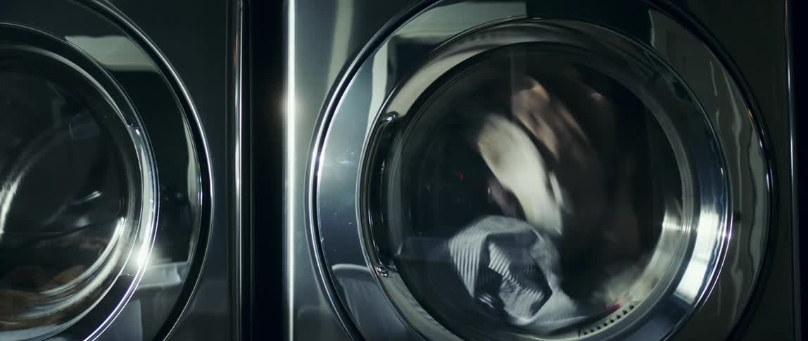 Laundry tumbles around in a washing machine
