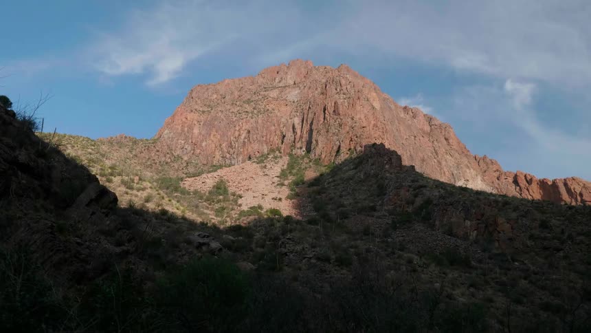 A mountain valley filled with scrub bushes