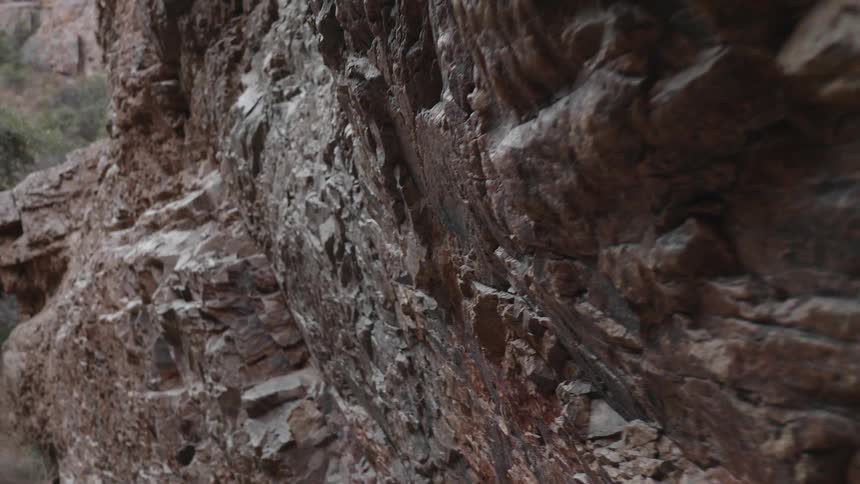 A closeup of a mountain is displayed