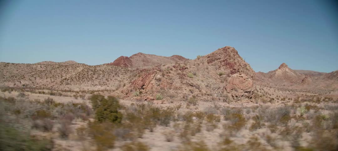 Rock formations and brush on a bright sunny day