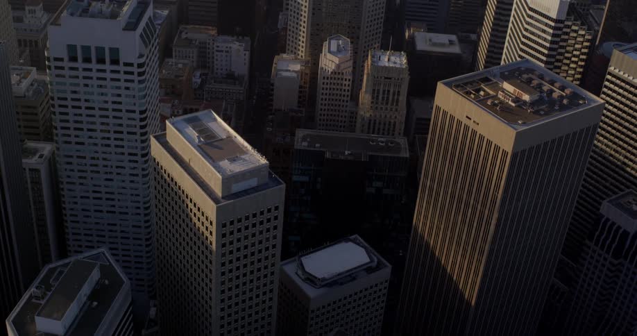 An aerial view of a downtown city is displayed