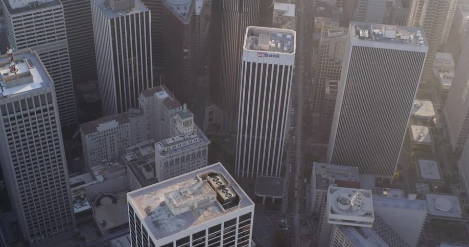A city with buildings skyscrapers streets and vehicles