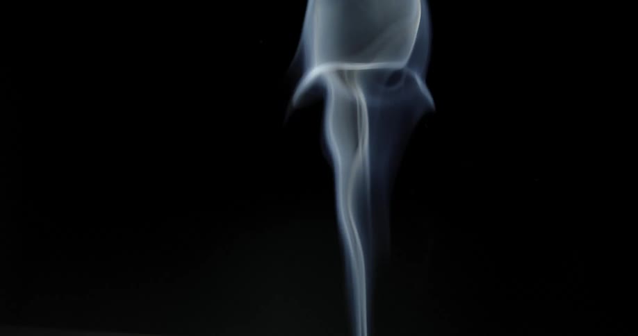 Smoke rising with a black background