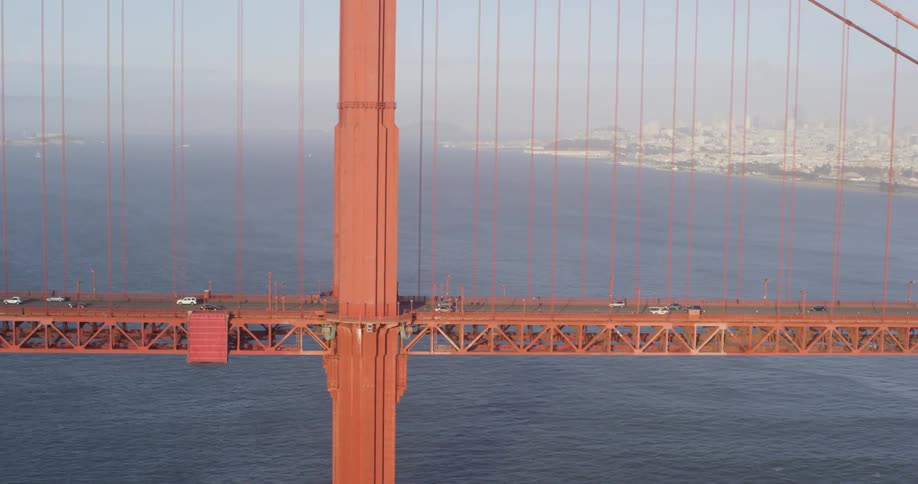 Traffic drives over the golden gate bridge in san francisco bay