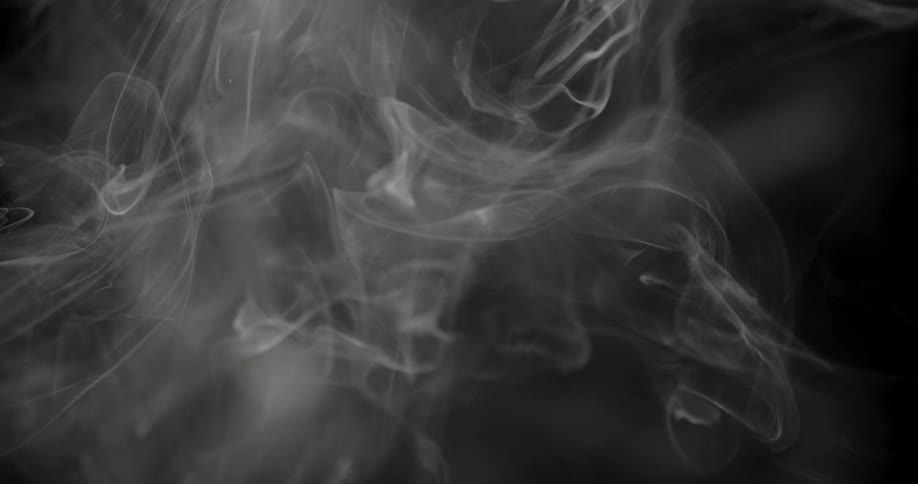 White smoke against a black background