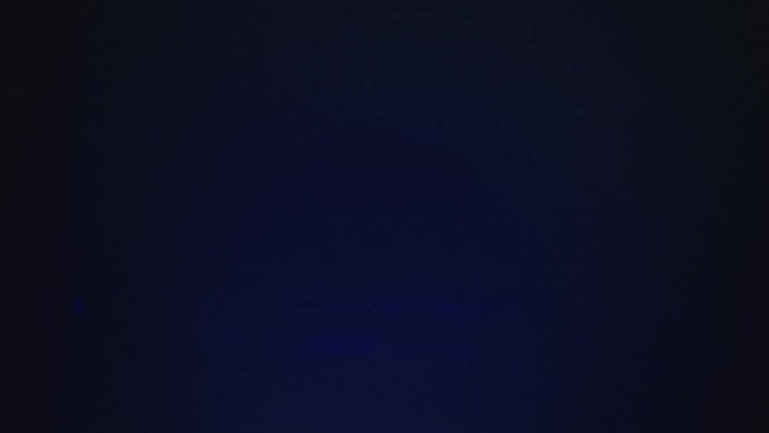 Lights of different blue hues reflecting on a surface