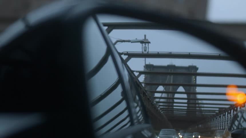 Cars driving across a bridge