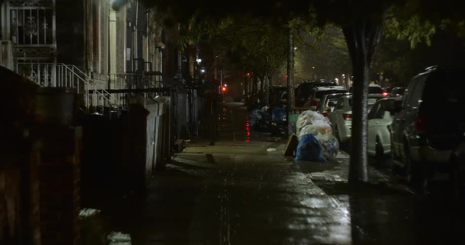The city block is empty at night
