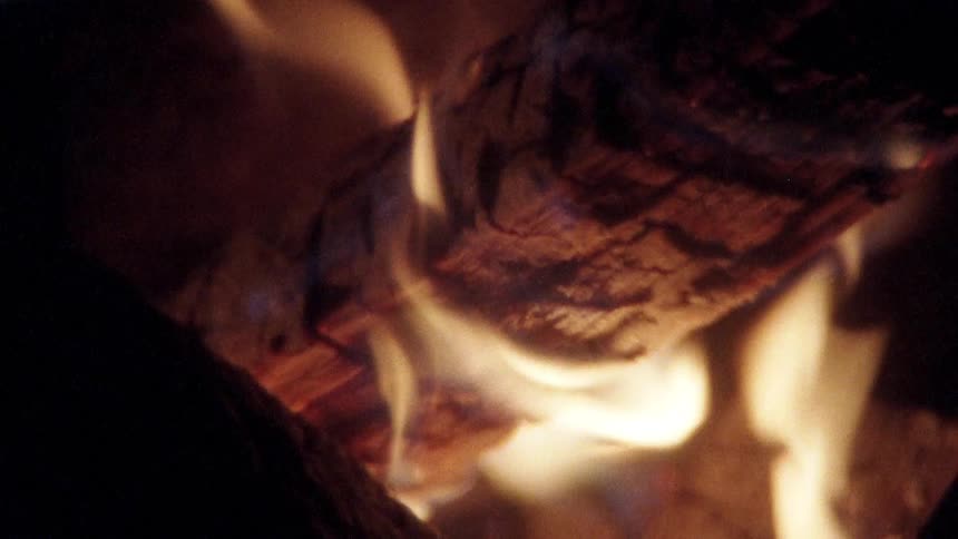 Close up of log engulfed in flames