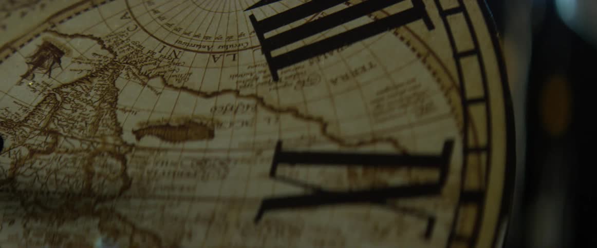 A clock is has a global map on its dial