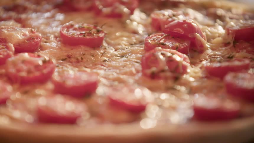 Cheese bubbling on a pizza