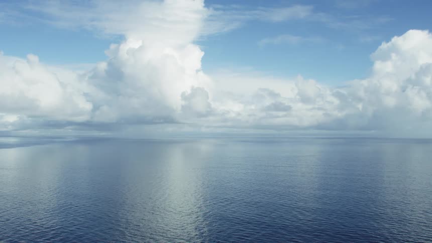 Clouds over a calm ocean