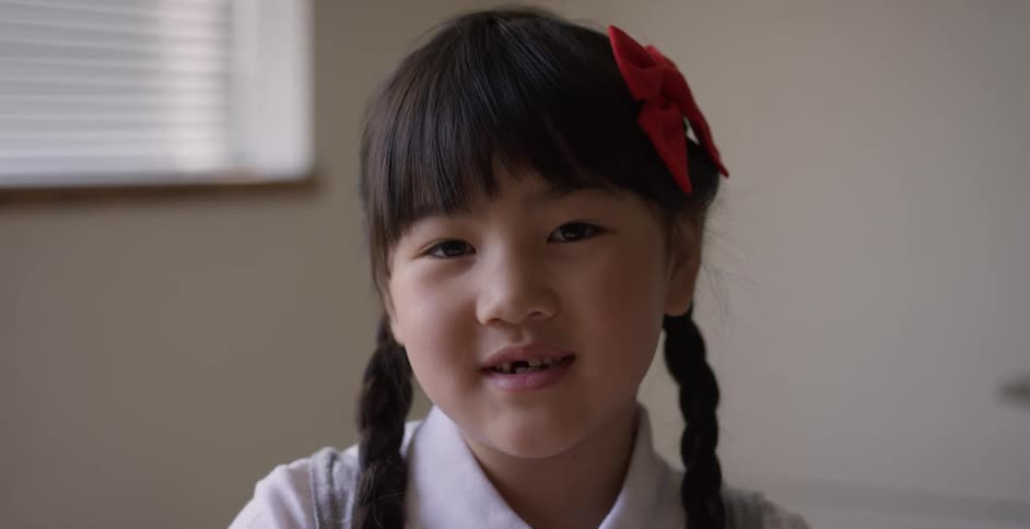 A little asian girl talking