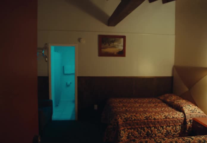 The door to the hotel opens to reveal an empty room