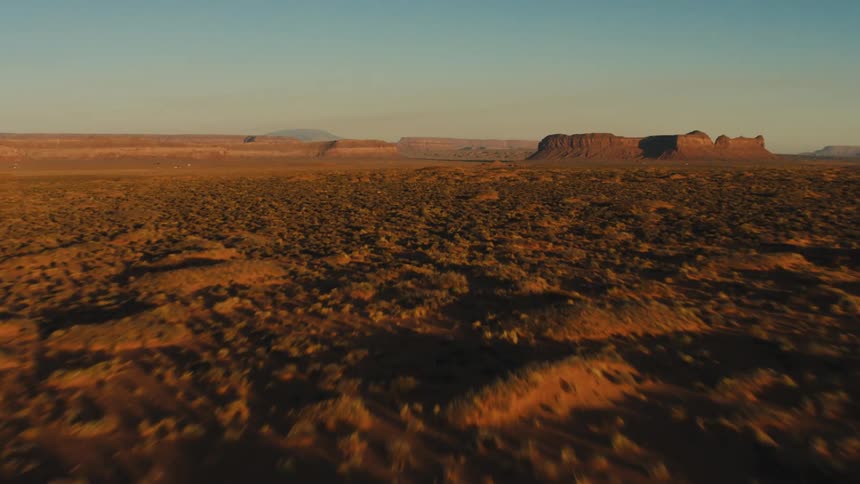 A view of a desert landscape is displayed
