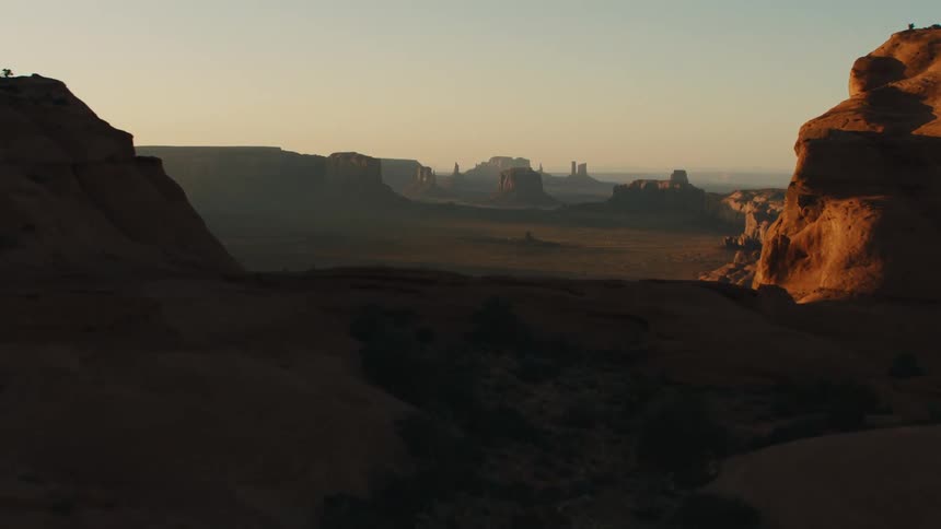 Aerial view of mesas in the badlands at sunset
