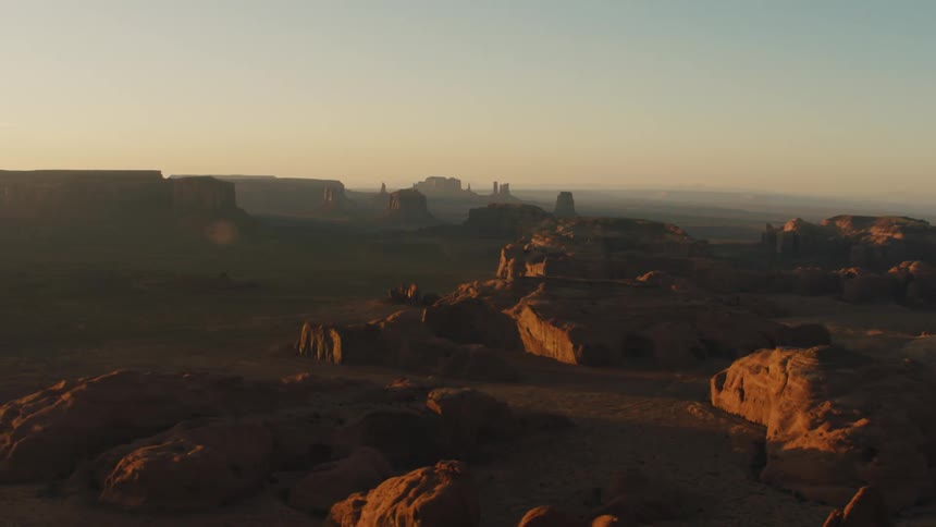 A mountain area is displayed at dusk