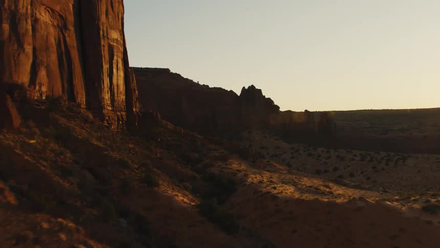 flying towards tall steep cliff