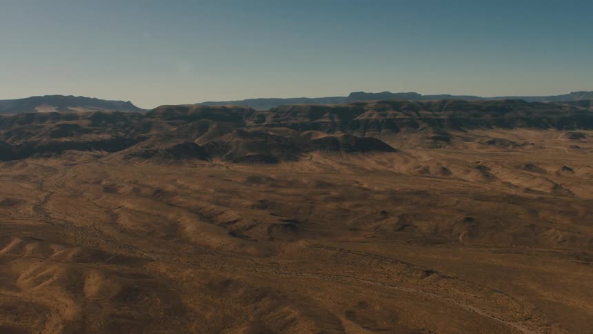Geographical formations in the badlands during the day