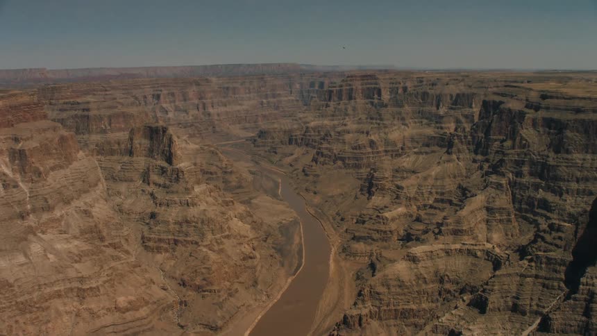 A river lies in a canyon in a rocky area
