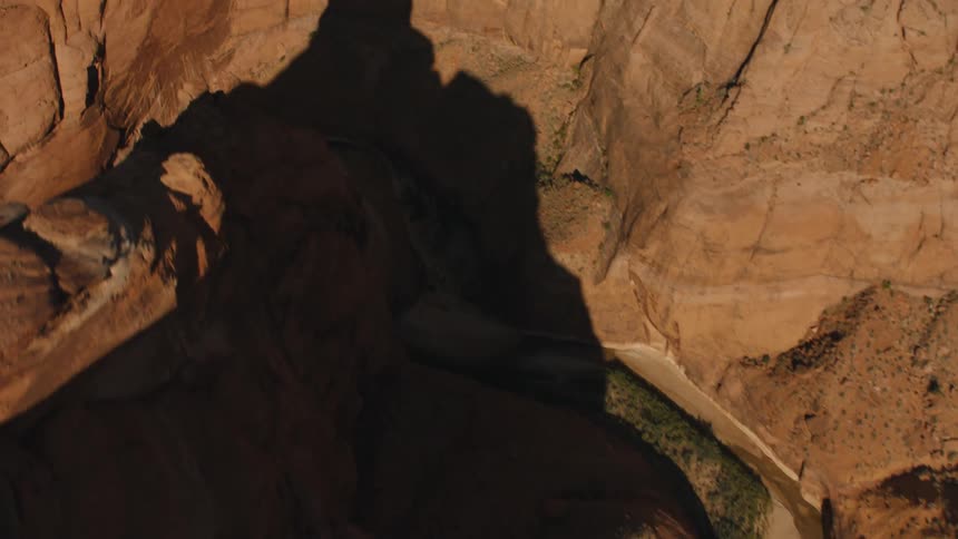 The valley of a canyon in the badlands during the day