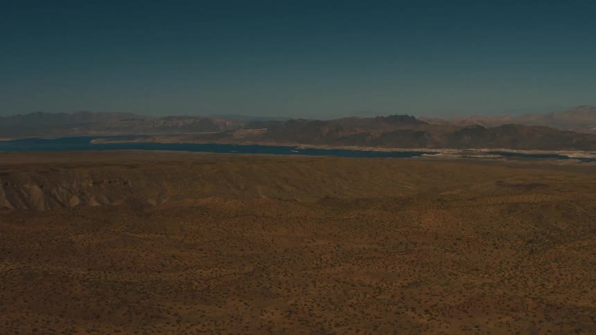 Blue lake in desert landscape