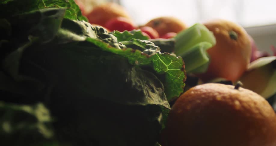 Wet produce sits in pile near window