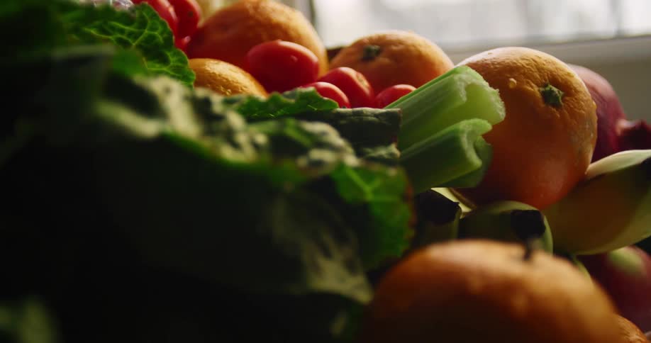 Close up of large pile of fresh fruits and vegetables