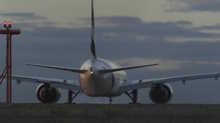 An airplane driving on the ground