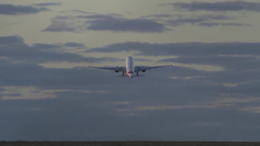 Large passenger plane taking off on a flight