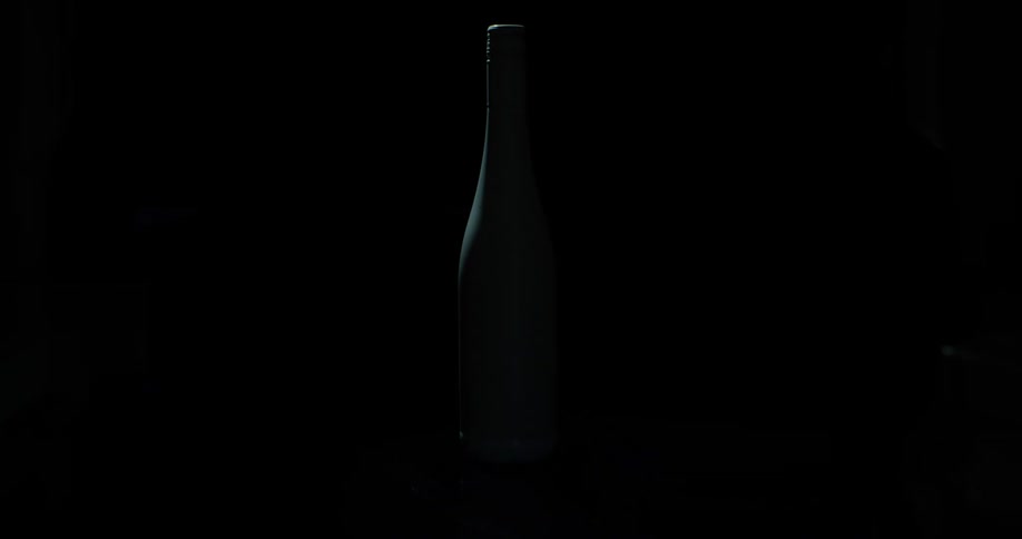 A white bottle turns black