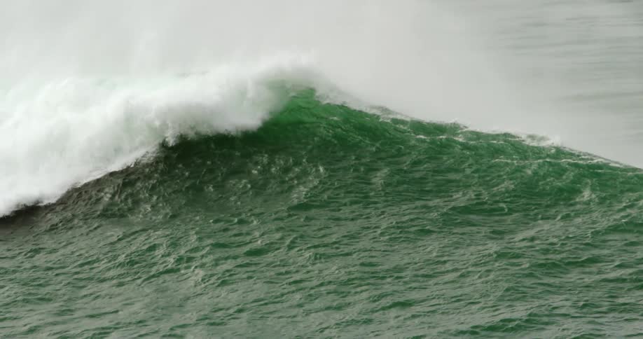 The large wave slowly falls