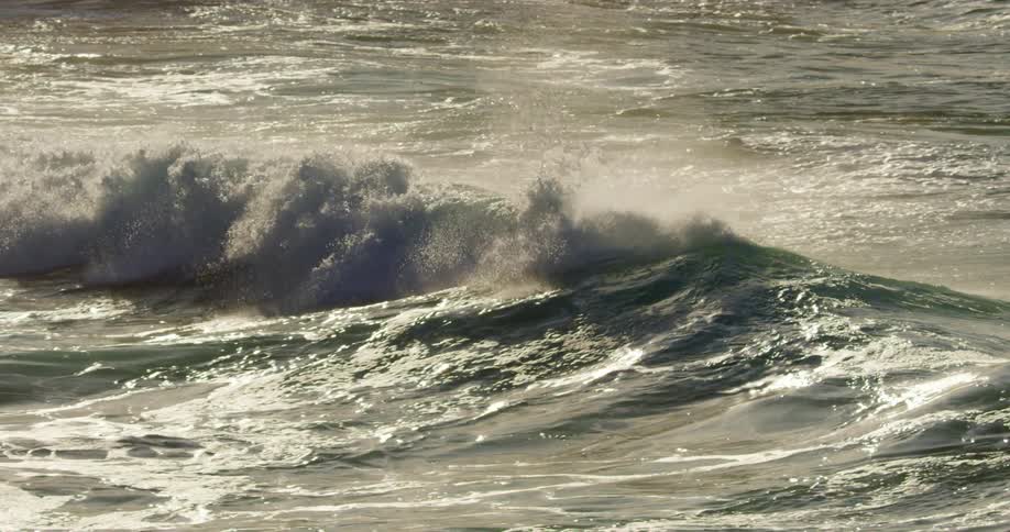 Waves form and break in the ocean