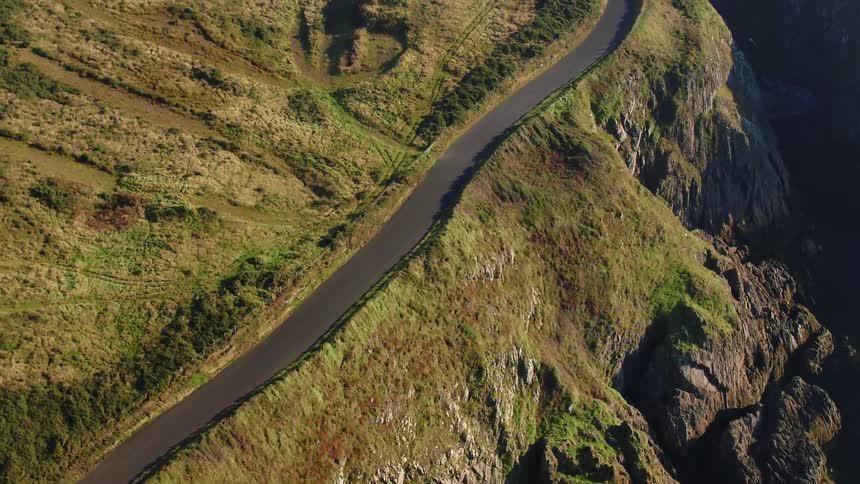 Aerial view of a long winding mountain road