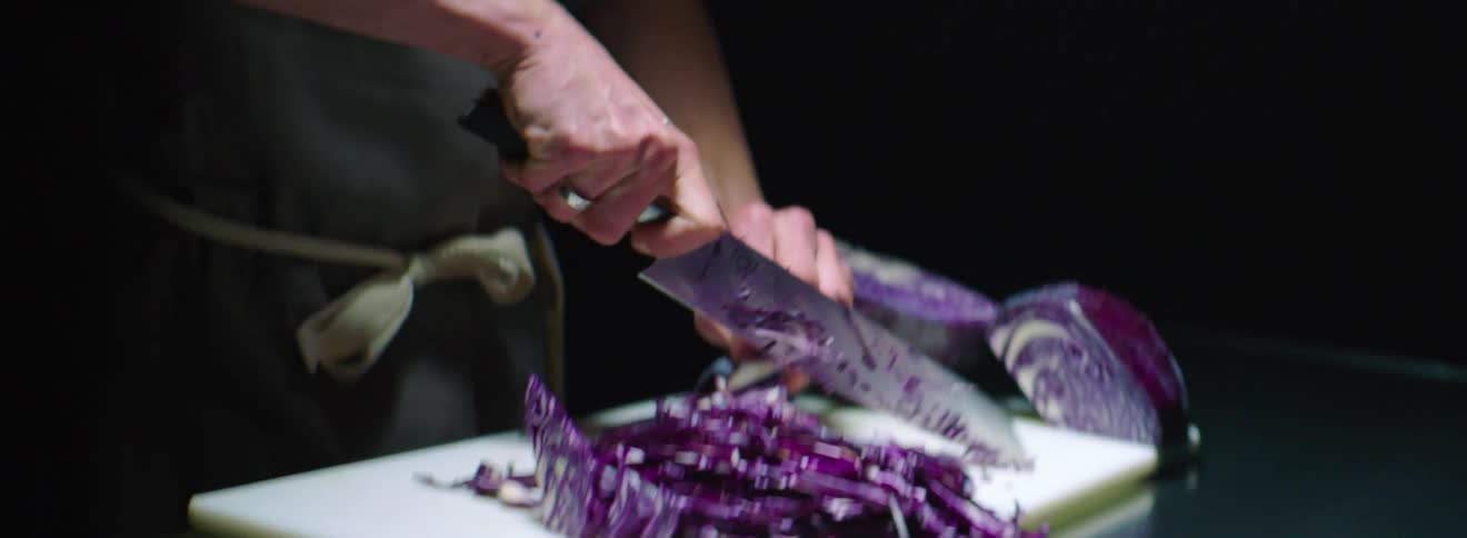 A man cutting food