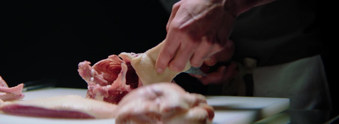 Man debones poultry
