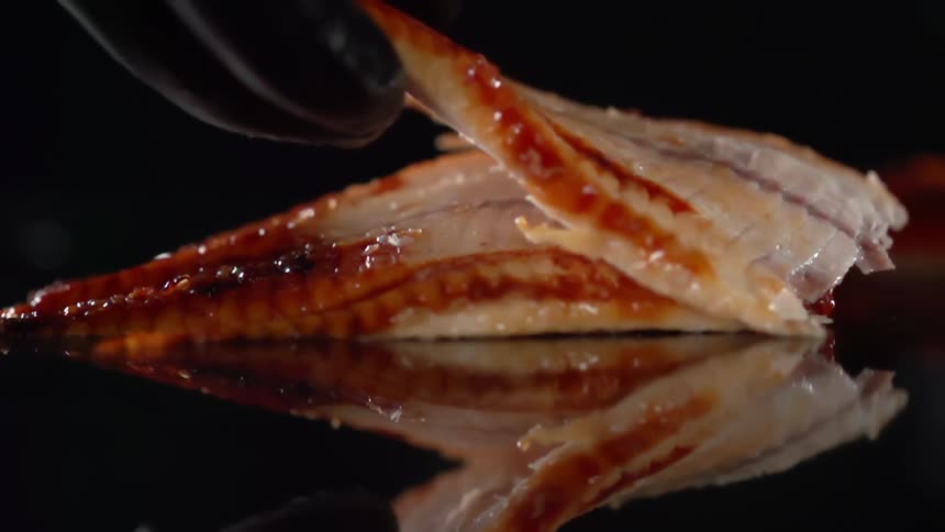 Seafood being placed on a counter