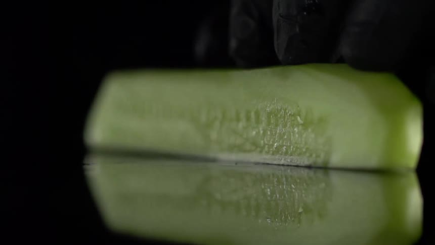 A cucumber is cut in half
