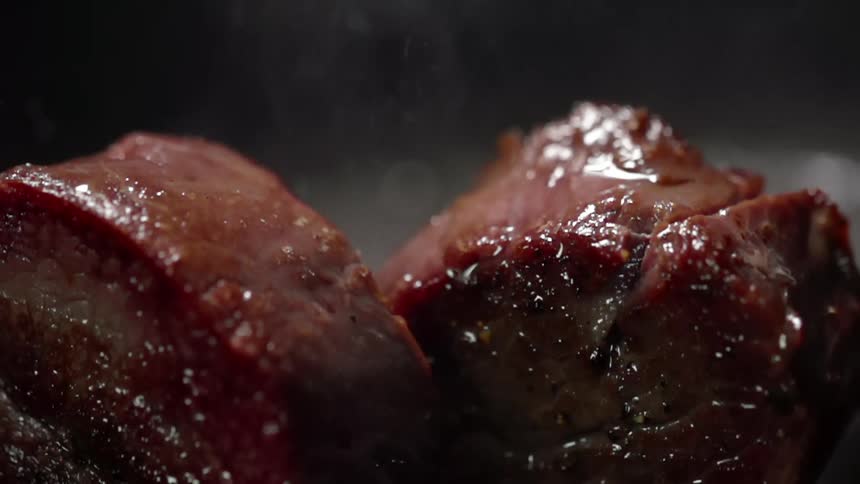 Close up of beef being cooked