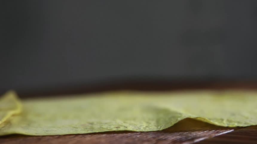 A tortilla wrap is placed on the table