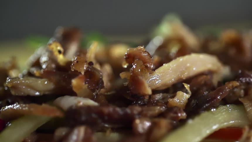 Close up of a chopped pork and vegetables dish