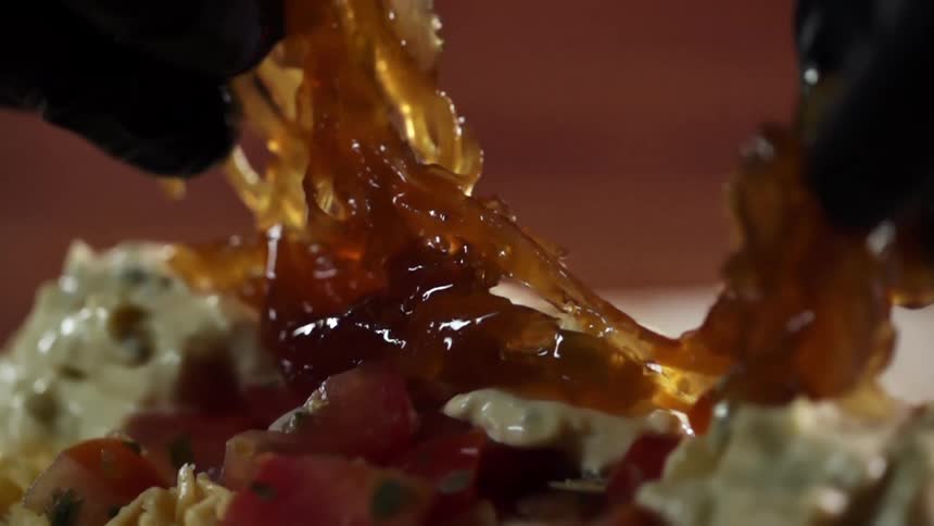 A person plating food