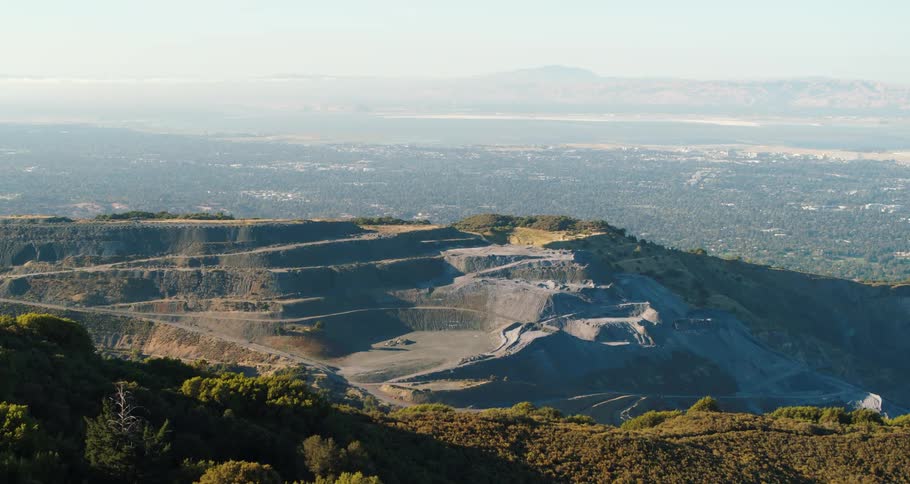 Aerial view of an open mine quarry in the mountains