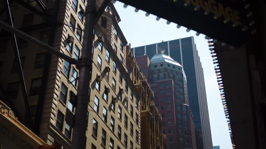 Tall buildings in a metropolis during the day