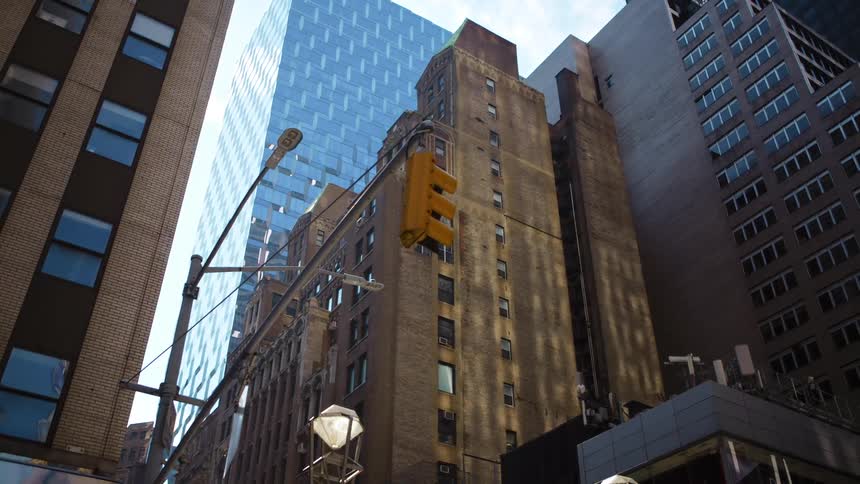 Skyscrapers on the corner of a city block during the day