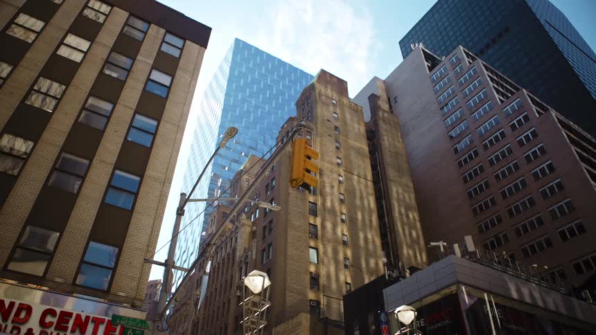 Tall buildings in the citys downtown at day