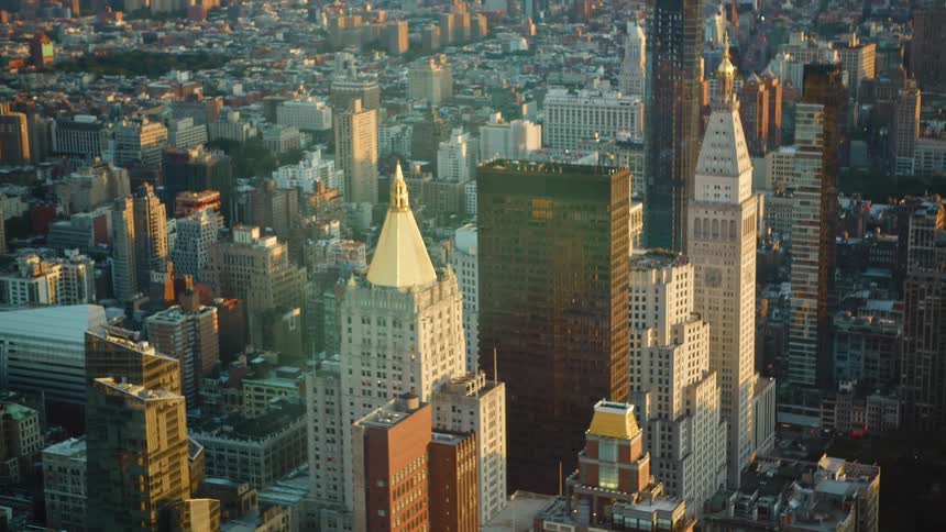 A big city skyline with skyscrapers and tall buildings seen from high rise office window