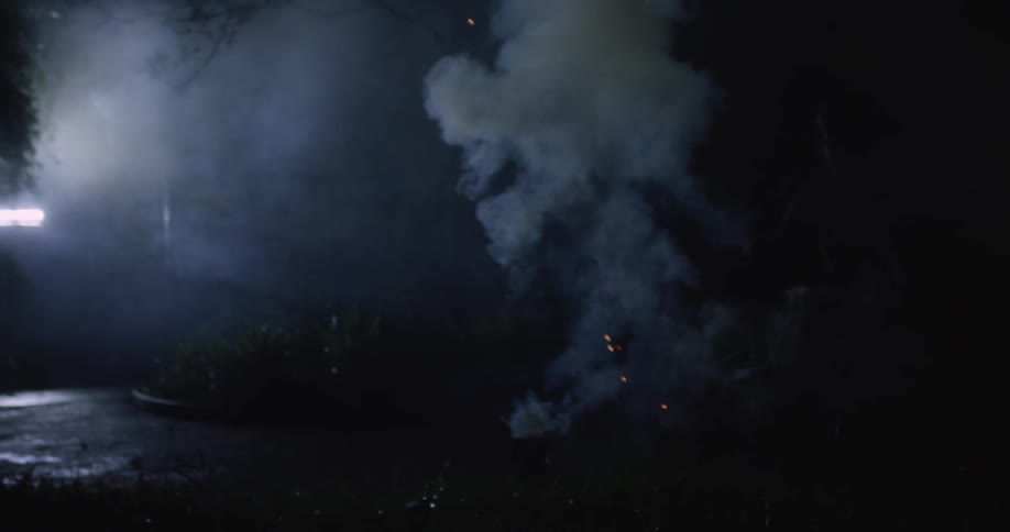 Someone lighting fireworks at night